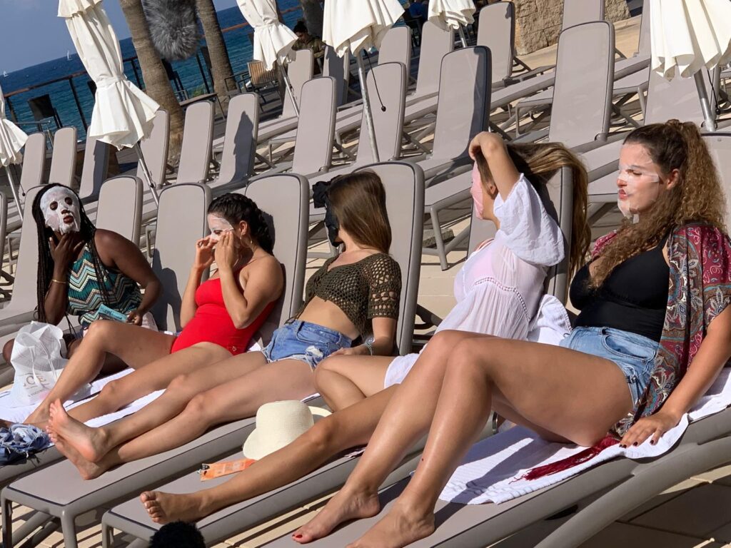 girls by pool at vacation